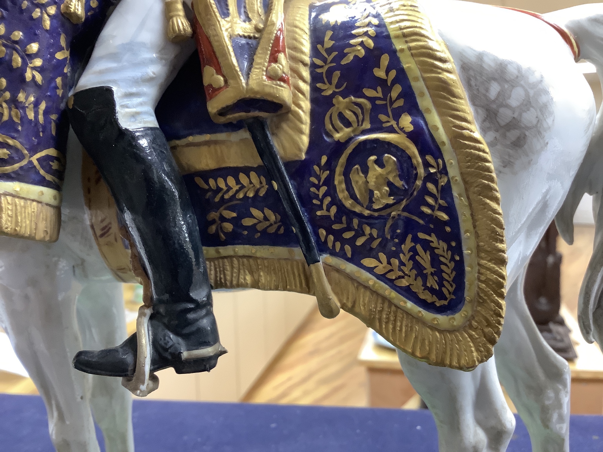 A large Dresden porcelain Waterloo Centenary equestrian group of the Duke of Wellington, retailers mark of Thomas Goode & Co and a similar equestrian group, 'Timbalier des Grenadiers a Cheval', pseudo mark, and an anothe